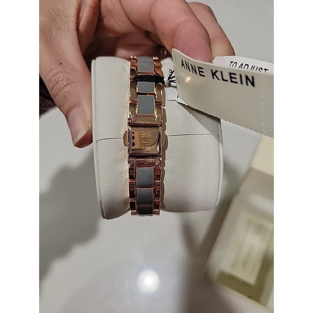 Anne Klein Women's Rose Gold-Tone and Light Pink Resin Bracelet Watch